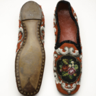 Pegged sole of Berlin work slippers, English, ca 1860s. Collection of the Bata Shoe Museum Image © 2023 Bata Shoe Museum, Photo: Ron Wood, Courtesy American Federation of Arts and the Bata Shoe Museum	